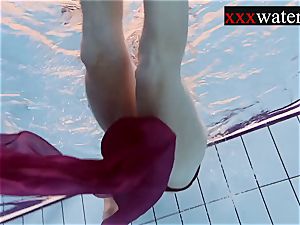 Smoking sizzling Russian redhead in the pool