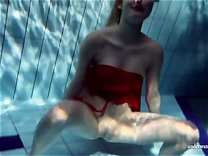 sizzling towheaded Lucie French teen in the pool