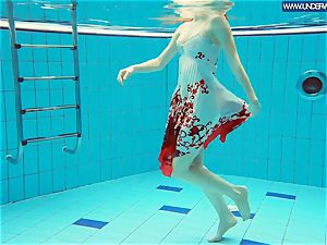 scorching polish redhead swimming in the pool