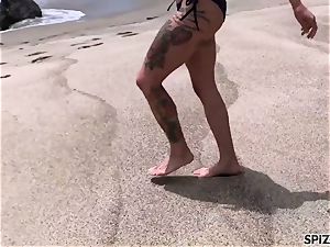 Anna Bell Peaks penetrating a huge trunk on the beach